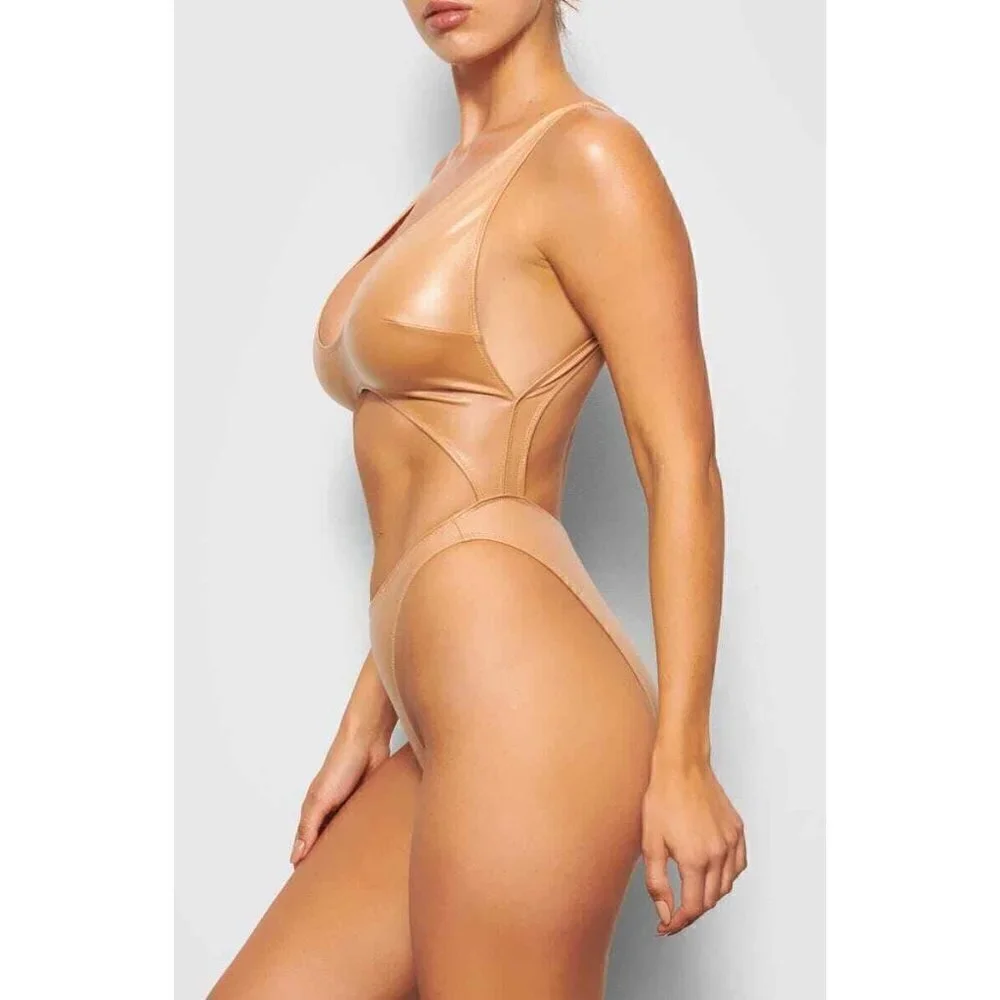 SKIMS Kim Kardashian Wet Jersey Cutout Swimsuit in Orche